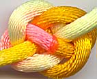 reverse of the finished flattened button knot