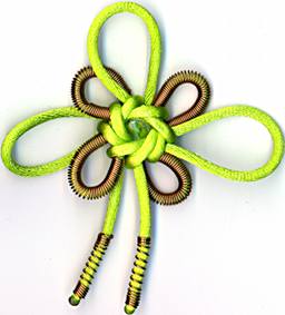 green octagonal flower knot with glass bead and coiled copper wire accents