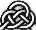 double coin knot tied in
	white outlined in black
