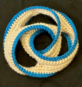 A crochetted trefoil knot.